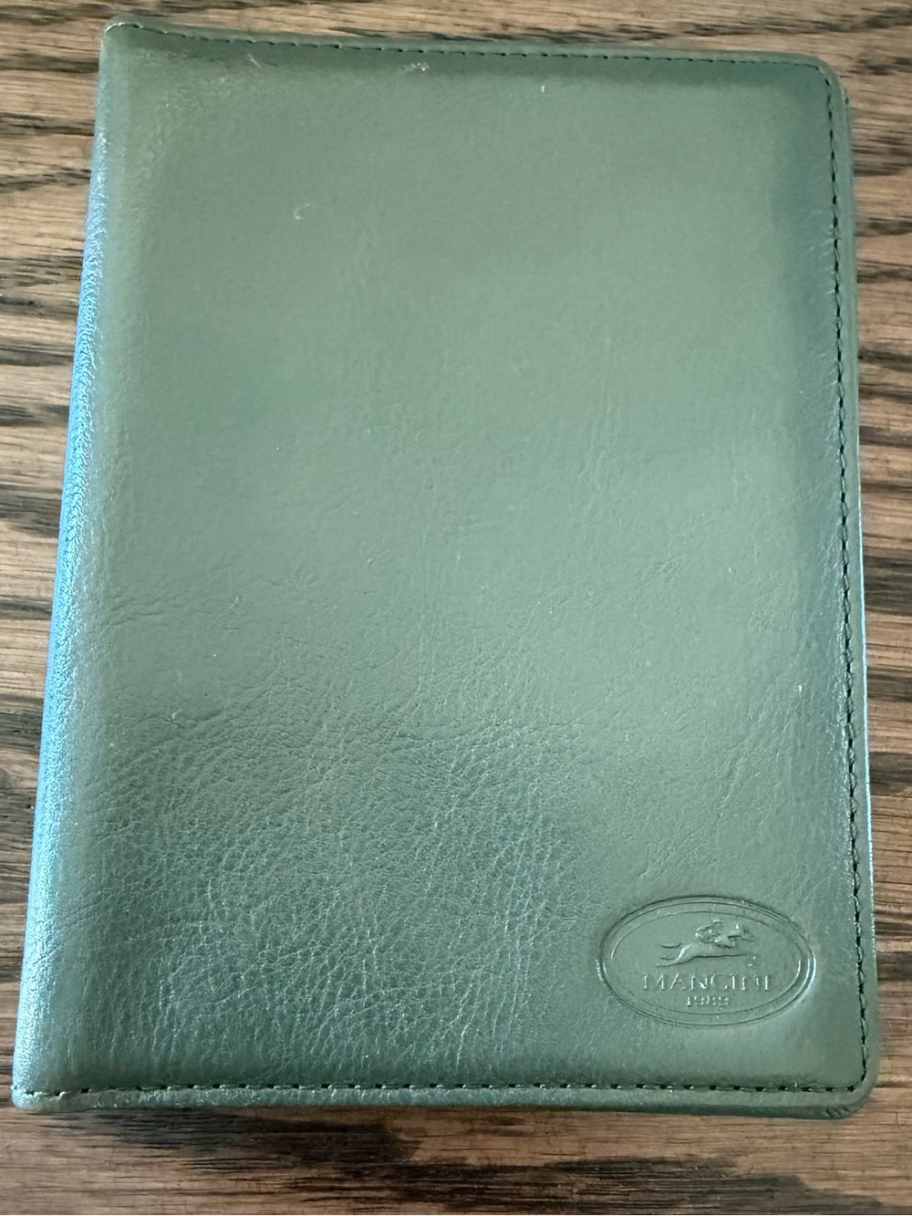 Mancini Green Leather Passport Wallet with Embossed Logo